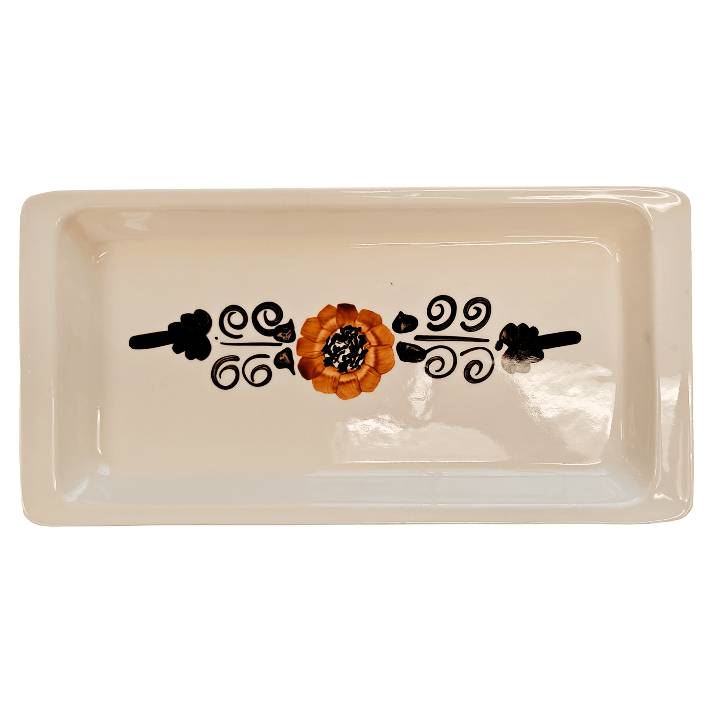 Soft-white rectangular serving tray made of Lapid stoneware with an orange and brown short petaled floral design in the bottom of the dish