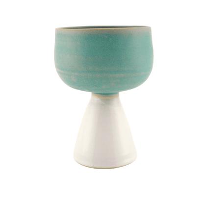 White and teal handcrafted ceramic wine vessel