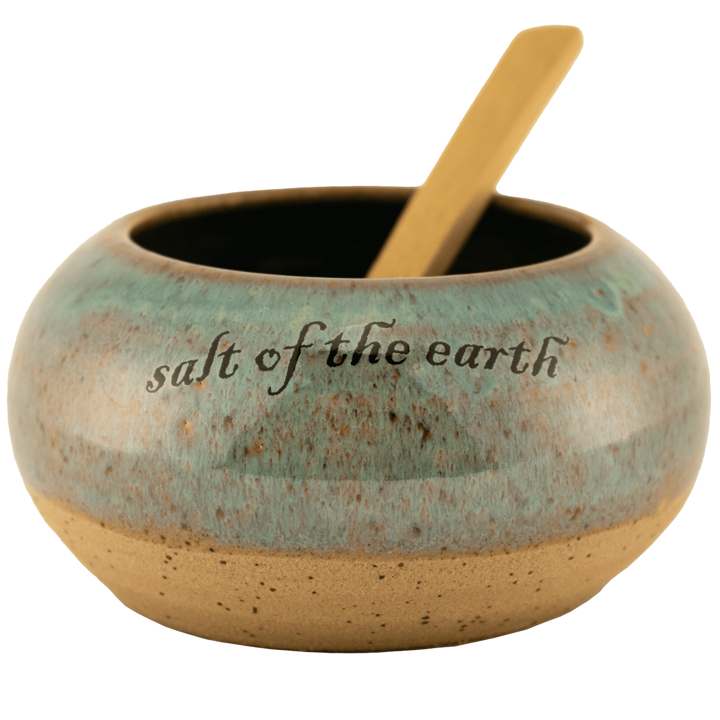 Deep teal ceramic salt bowl that says "salt of the earth" in English and Hebrew with a wooden spoon