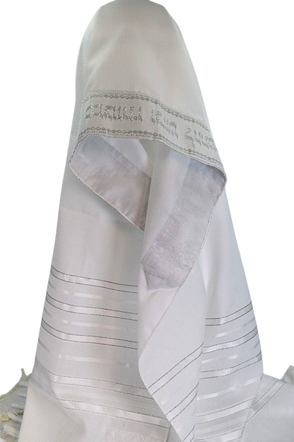 white prayer shawl with silver stripes and stitching