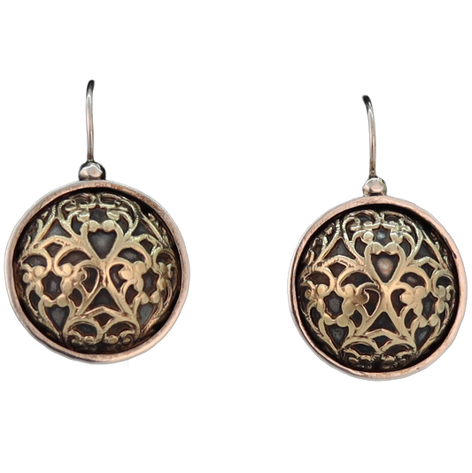 Round dome shaped earrings with gold pattern over black 