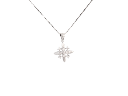 A small, sparkling Jerusalem Cross pendant accented with brilliant crystals