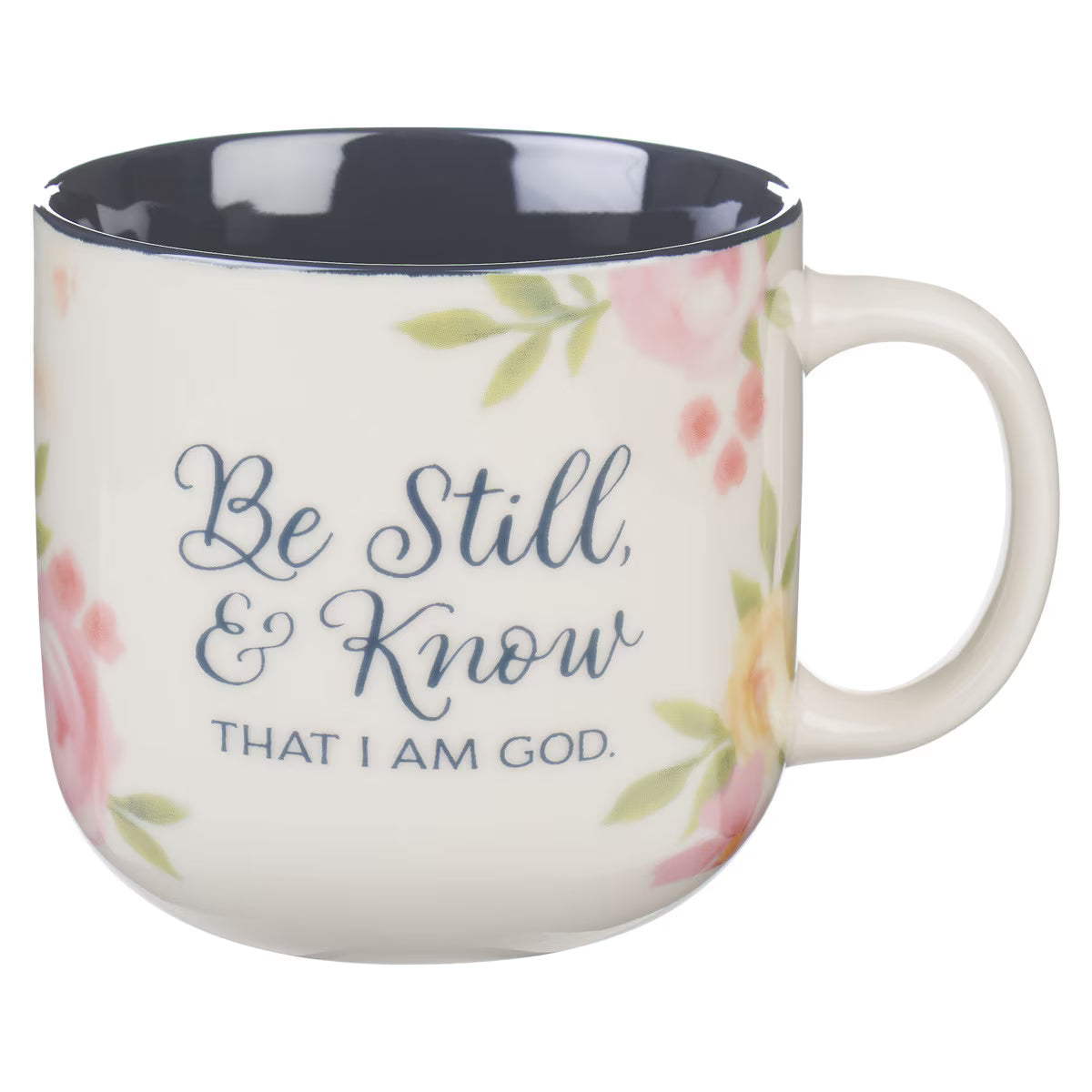 White floral mug with dark blue interior and motivational quote in blue script