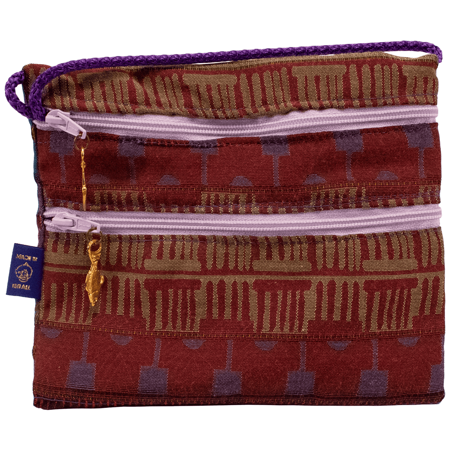 Double zipper horizontal crossbody bag with lavender zippers red and tan tones and roman-like pattern 