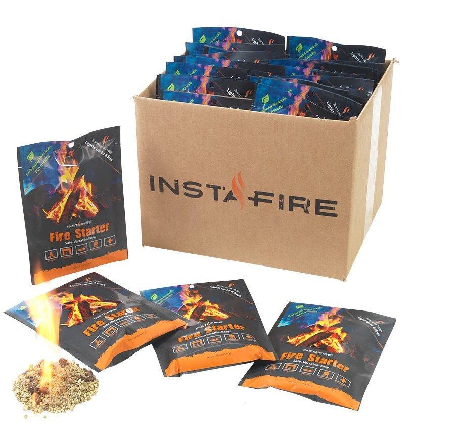 Box of Instafire Fire Starter with packets displayed in front and a small pile of fire starter burning