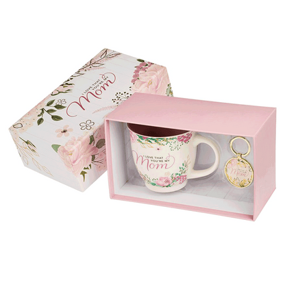 pink floral mug and keychain in pink box next to gift box lid 