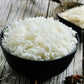 long grain white rice in black bowl