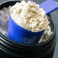 ready hour powdered milk blue scoop filled with powder 