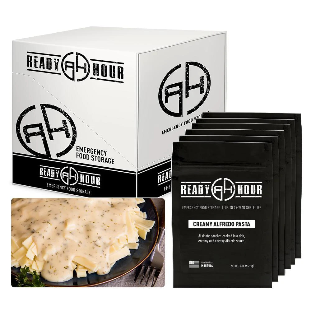 ready hour creamy chicken alfredo pasta case pack individual pack and cooked pasta with creamy sauce on top on black plate 
