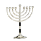 claasic silver menorah with black accents on trunk of menorah 