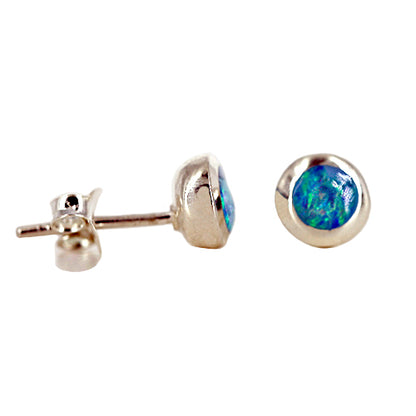 Synthetic blue opal round stud earrings set in a polished metal base