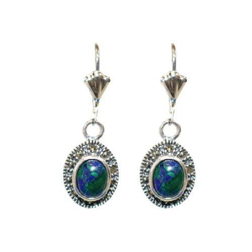 Oval-shaped vintage-style dangle earrings with an eilat stone encased in a sterling silver pendant